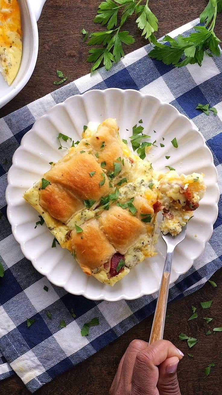 Sausage Crescent Roll Breakfast Casserole Recipe – Flaky crescent rolls stuffed with sausage and cheese, baked in a fluffy egg custard, and topped with everything but the bagel seasoning. This casserole is a hearty and flavorful way to start the day! Perfect for weekends, holidays, or brunch with friends.
