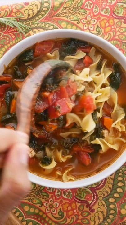 Turkey Noodle Soup – the BEST soup EVER! Turkey, spinach, tomatoes, and noodles simmered in turkey broth. A great way to use up leftover Thanksgiving turkey! Turkey, diced tomatoes, onion, carrot, celery, tomato paste, Italian seasoning, basil, garlic, turkey stock, and egg noodles. Can make on the stovetop or in the crockpot. Freeze leftover for a quick meal later. Everyone RAVES about this soup!