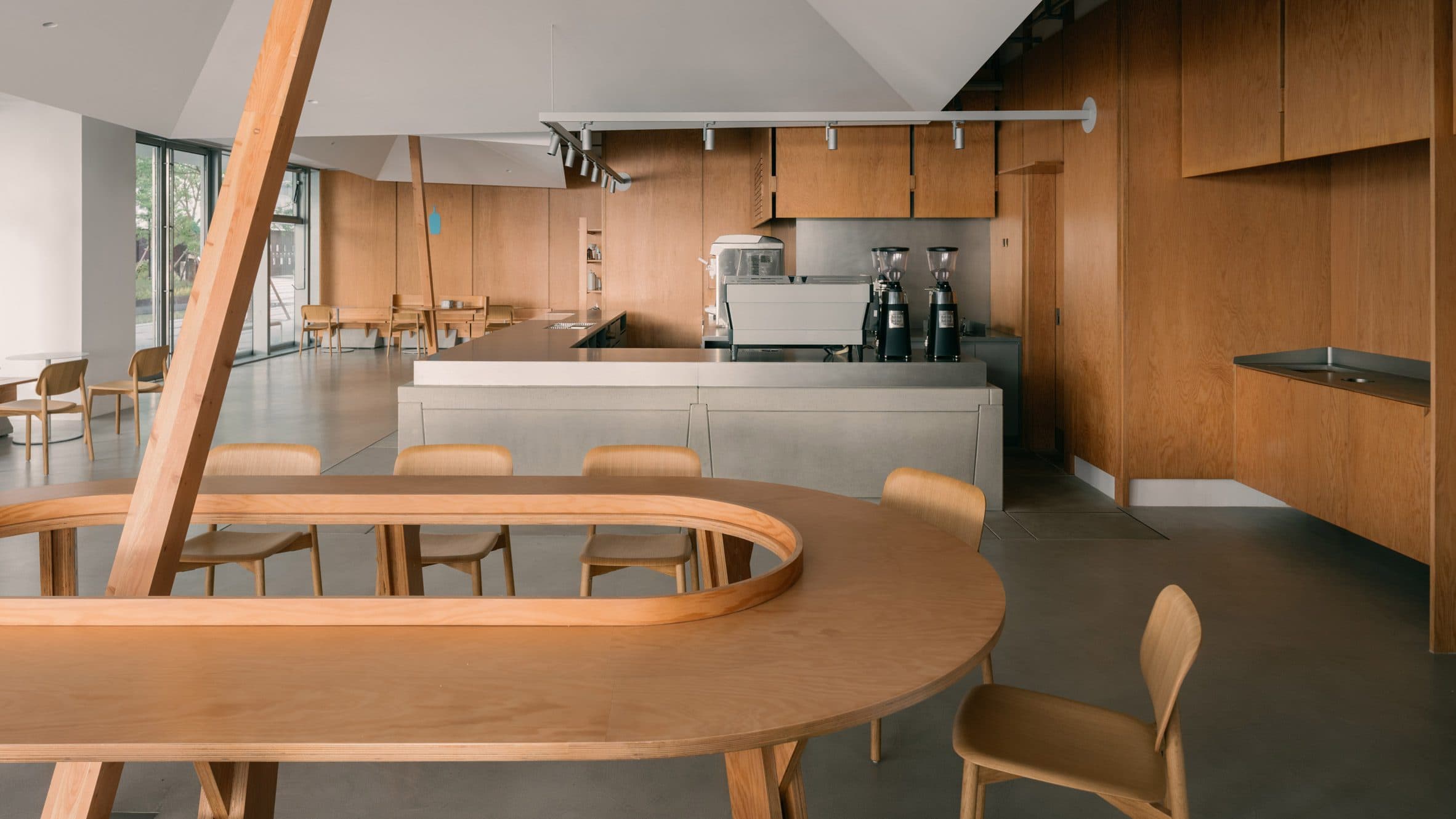 Tent-like canopies bring "outdoor feeling" to Blue Bottle Coffee at West Bund