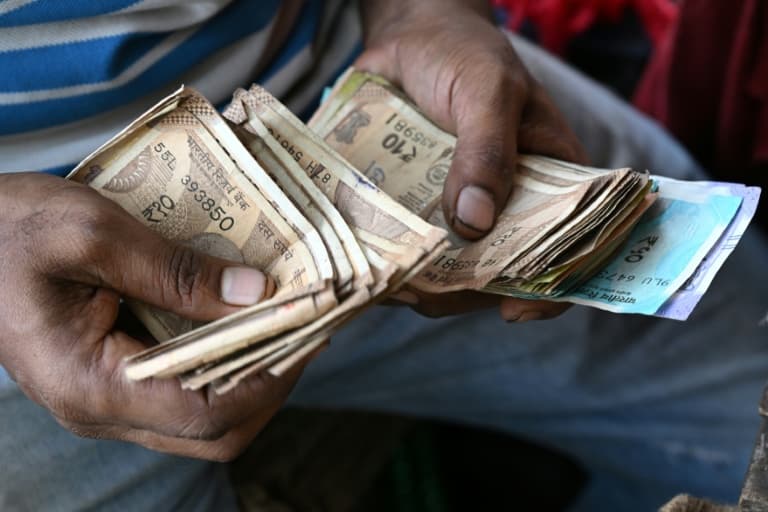 Indian rupee hits fresh record low past 90 per dollar