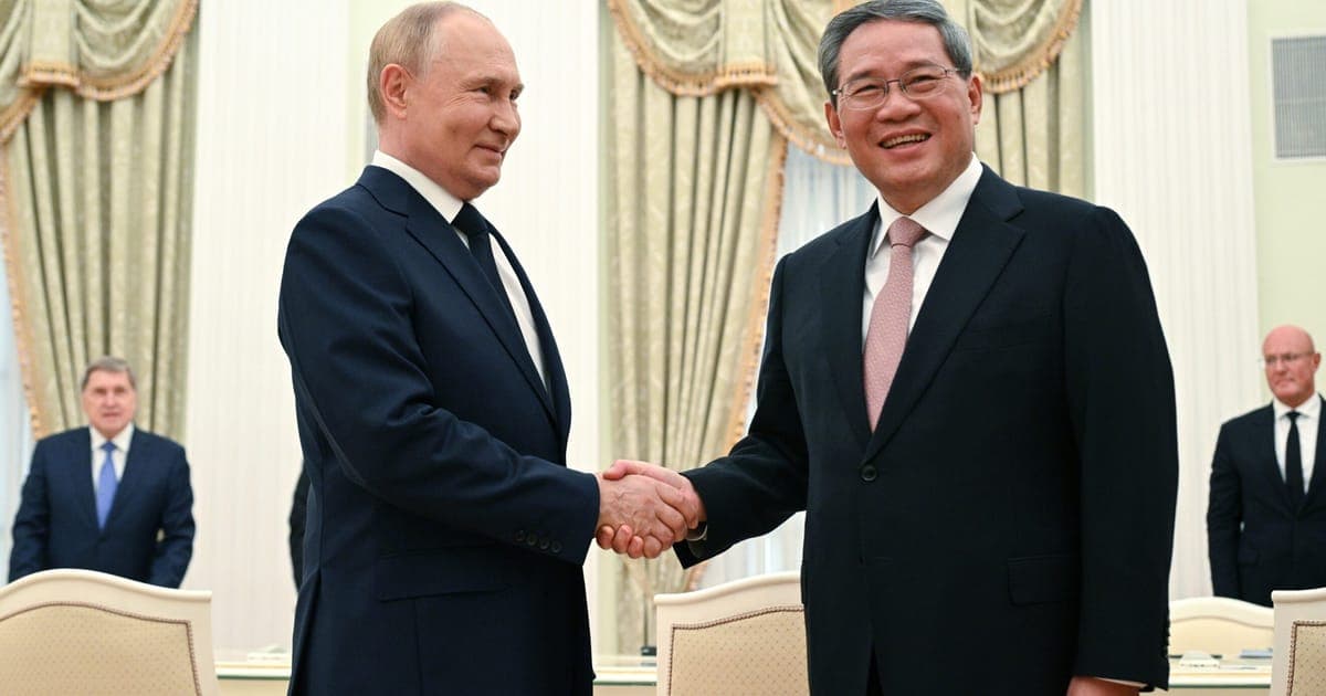 Putin deepens China ties with visa-free travel regime offer